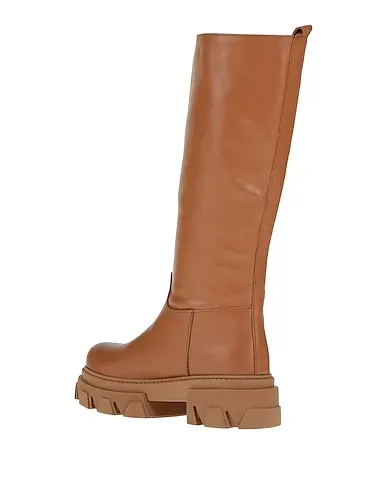 https://images.styletyx.com/images/tan-leather-boots-pregunta-971968979_3.webp