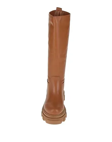 https://images.styletyx.com/images/tan-leather-boots-pregunta-971968979_4.webp