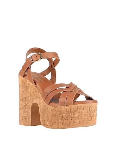 https://images.styletyx.com/images/tan-leather-sandals-nila-nila-822873_2.webp