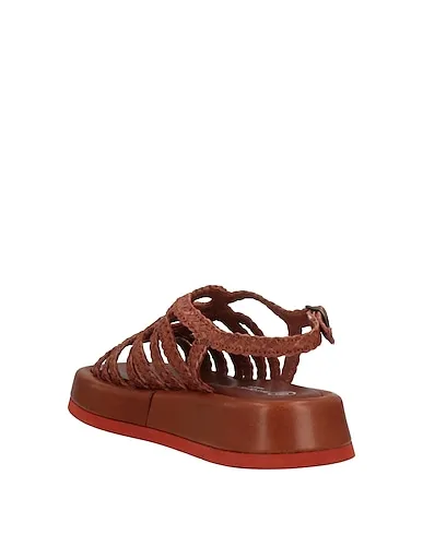 https://images.styletyx.com/images/tan-leather-sandals-pas-de-rouge-13145927_3.webp