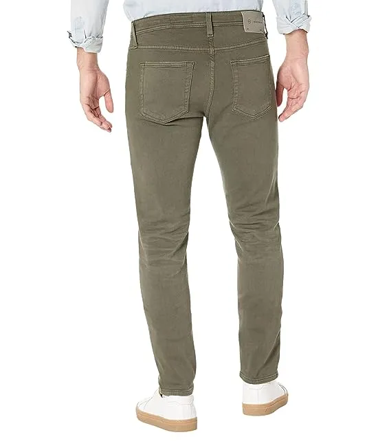 https://images.styletyx.com/images/tellis-slim-in-7-years-sulfur-armory-green-ag-jeans-13423981_2.webp