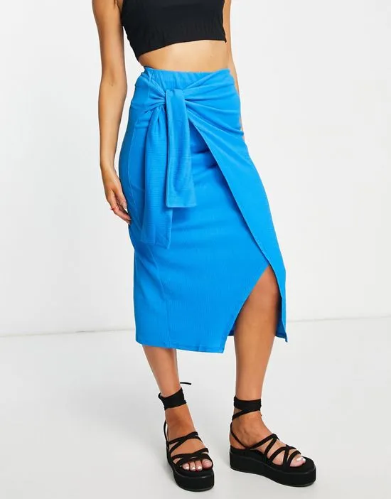 https://images.styletyx.com/images/textured-knot-wrap-midi-skirt-in-blue-stradivarius-2031671_4.webp