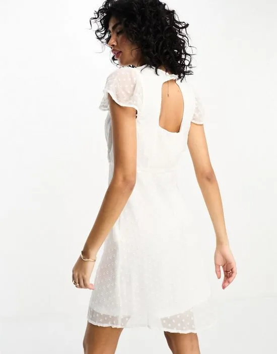 https://images.styletyx.com/images/textured-mini-dress-in-white-vila-1003806529_4.webp