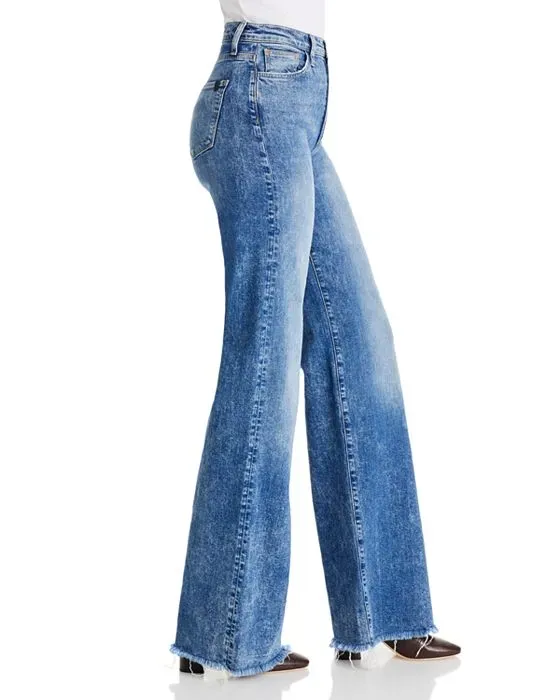 https://images.styletyx.com/images/the-mia-high-rise-wide-leg-jeans-in-gila-joe-s-jeans-3073550_3.webp