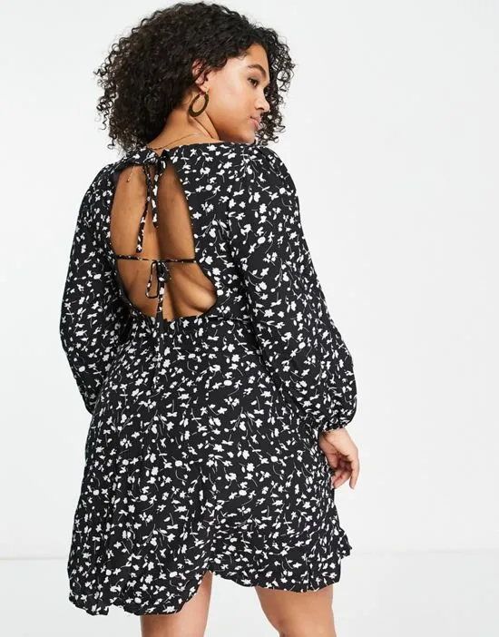 https://images.styletyx.com/images/tie-back-floral-mini-dress-in-black-missguided-plus-1820629_2.webp
