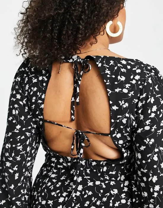 https://images.styletyx.com/images/tie-back-floral-mini-dress-in-black-missguided-plus-1820629_4.webp