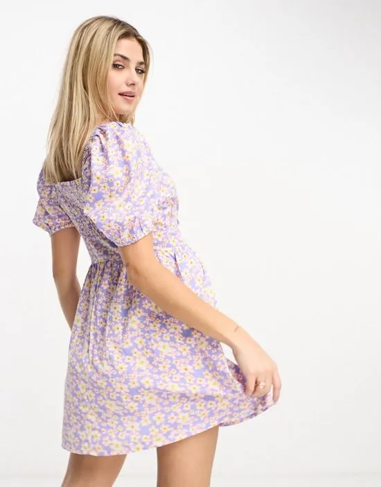 https://images.styletyx.com/images/tie-front-mini-tea-dress-in-purple-floral-wednesday-s-girl-13316198_2.webp