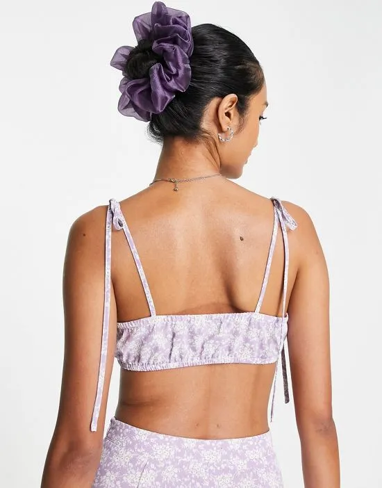 https://images.styletyx.com/images/tie-strap-bralette-top-in-floral-print-part-of-a-set-lola-may-2490679_3.webp