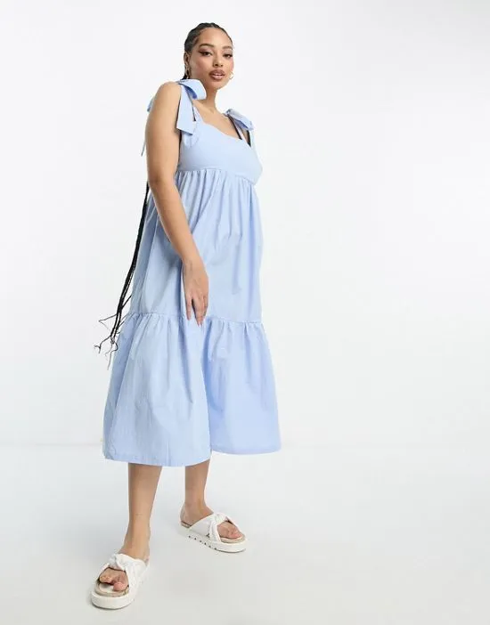 https://images.styletyx.com/images/tiered-midi-dress-with-tie-straps-in-blue-poplin-the-frolic-plus-13293080_3.webp