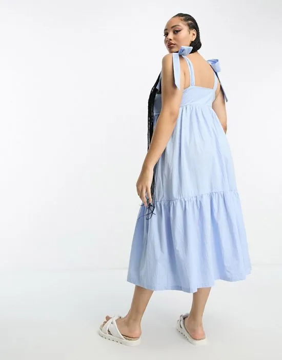 https://images.styletyx.com/images/tiered-midi-dress-with-tie-straps-in-blue-poplin-the-frolic-plus-13293080_4.webp