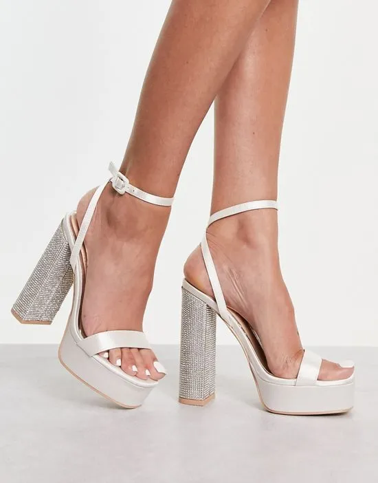 https://images.styletyx.com/images/topaz-embellished-heeled-sandals-in-ivory-satin-be-mine-13250496_1.webp