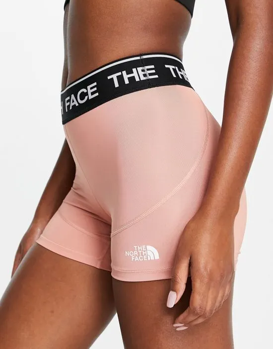 https://images.styletyx.com/images/training-logo-shorts-in-pink-the-north-face-2481665_1.webp