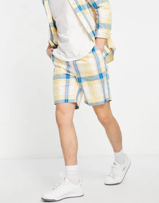 https://images.styletyx.com/images/trehurst-check-shorts-in-yellow-farah-13614086_2.webp