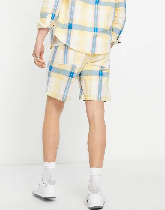 https://images.styletyx.com/images/trehurst-check-shorts-in-yellow-farah-13614086_3.webp
