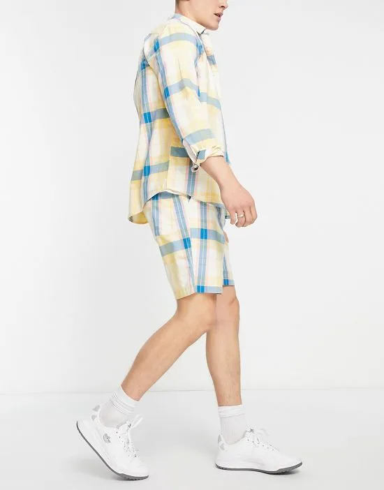 https://images.styletyx.com/images/trehurst-check-shorts-in-yellow-farah-13614086_4.webp