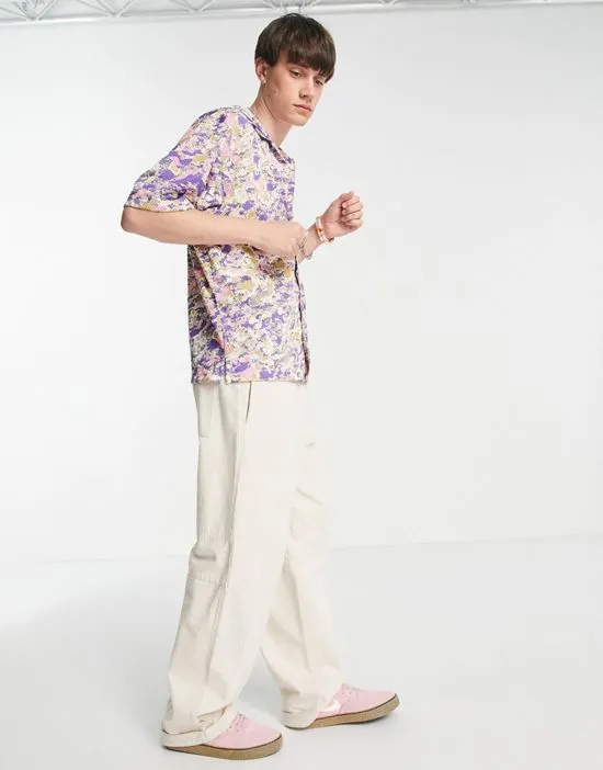 https://images.styletyx.com/images/trek-division-all-over-print-revere-collar-shirt-in-purple-nike-2475462_4.webp