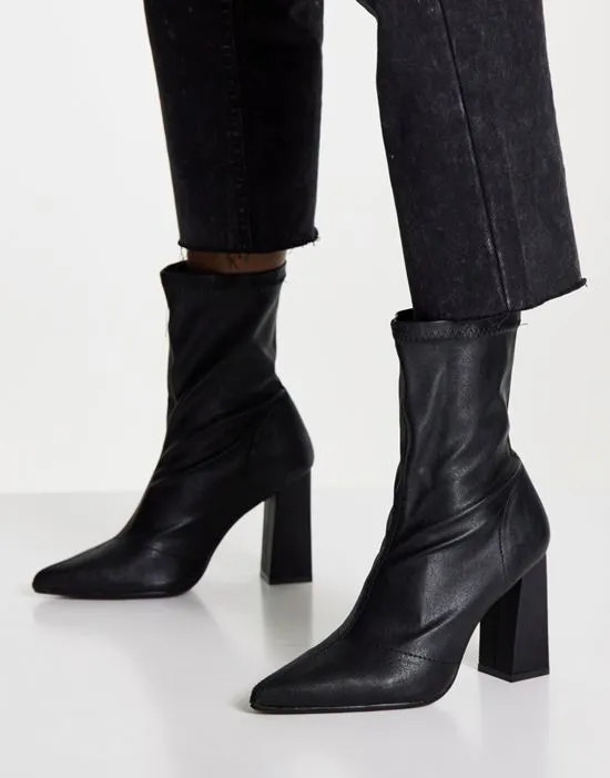 https://images.styletyx.com/images/truffle-collection-wide-fit-heeled-sock-boots-in-black-truffle-collection-wide-fit-2787363_2.webp