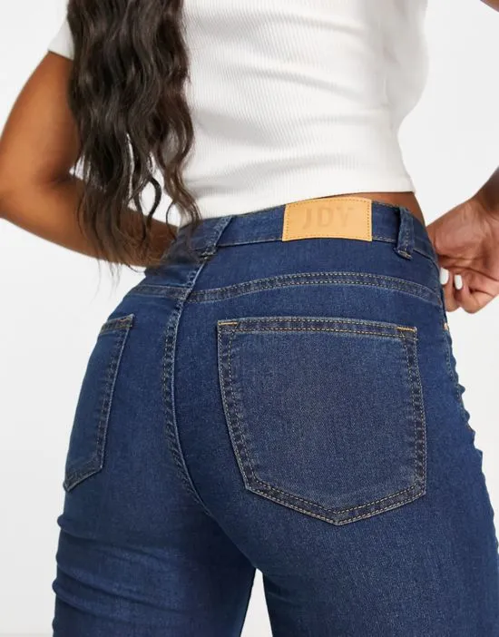 https://images.styletyx.com/images/tulga-high-waist-skinny-jeans-in-dark-blue-jdy-2135417_2.webp