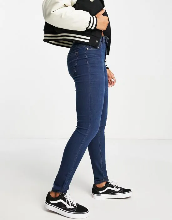 https://images.styletyx.com/images/tulga-high-waist-skinny-jeans-in-dark-blue-jdy-2135417_3.webp