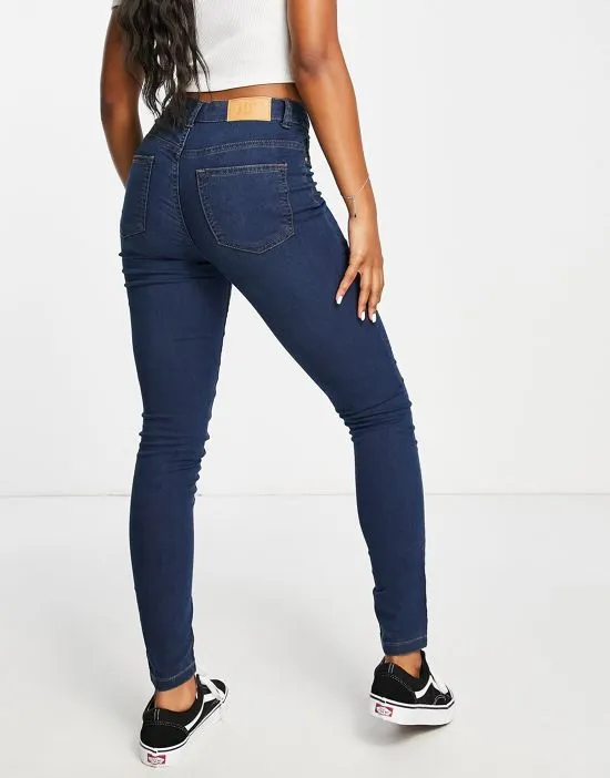 https://images.styletyx.com/images/tulga-high-waist-skinny-jeans-in-dark-blue-jdy-2135417_4.webp