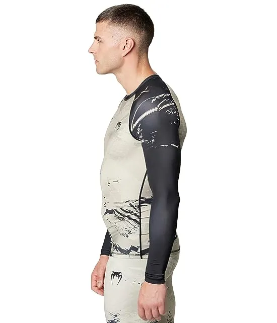 https://images.styletyx.com/images/ufc-venum-authentic-fight-week-2-0-long-sleeve-rashguard-venum-2252179_4.webp