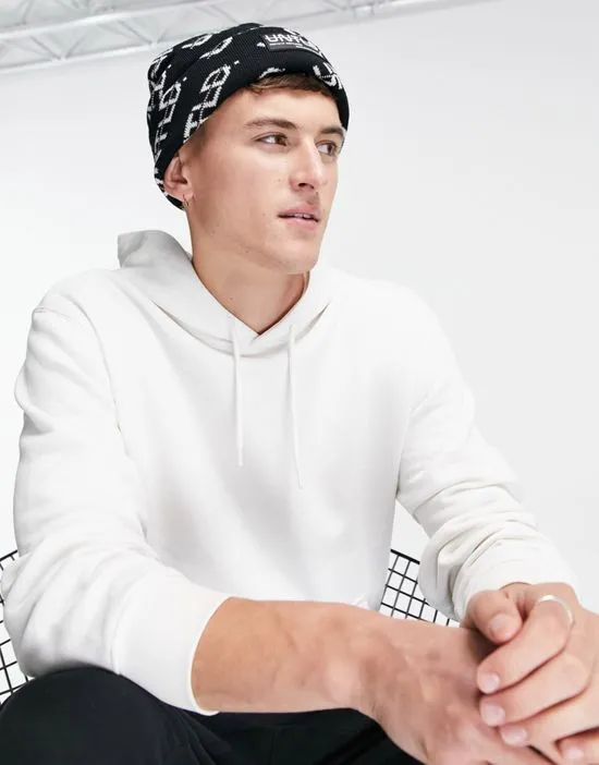 https://images.styletyx.com/images/untitled-jacquard-docker-beanie-in-polyester-blend-in-black-black-topman-13614590_3.webp