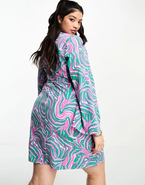 https://images.styletyx.com/images/urban-threads-plus-wrap-mini-dress-in-multi-abstract-print-urban-threads-curve-1003583191_4.webp
