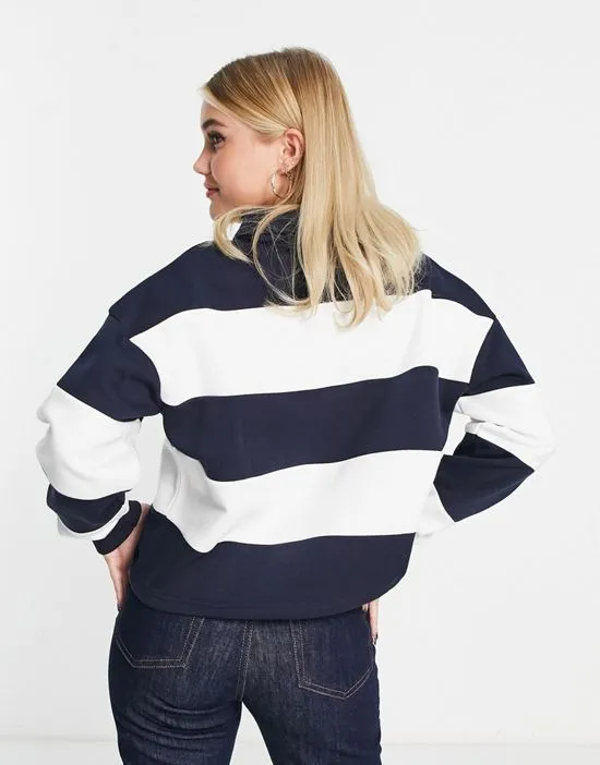 https://images.styletyx.com/images/varsity-striped-cropped-polo-shirt-with-logo-detail-in-navy-and-white-pull-bear-13028658_4.webp