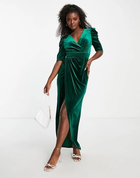 https://images.styletyx.com/images/velvet-maxi-dress-with-thigh-split-in-emerald-green-little-mistress-2755724_3.webp