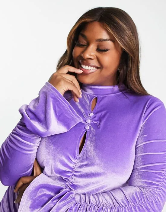 https://images.styletyx.com/images/velvet-ruched-cut-out-detail-mini-dress-in-lilac-the-frolic-plus-2822609_3.webp