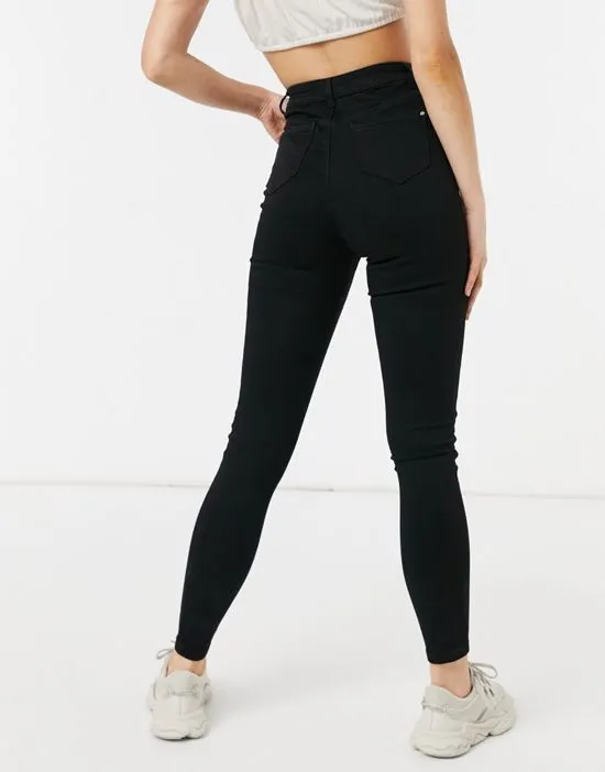 https://images.styletyx.com/images/vice-high-waist-skinny-jeans-with-belt-loops-in-black-missguided-2752852_2.webp