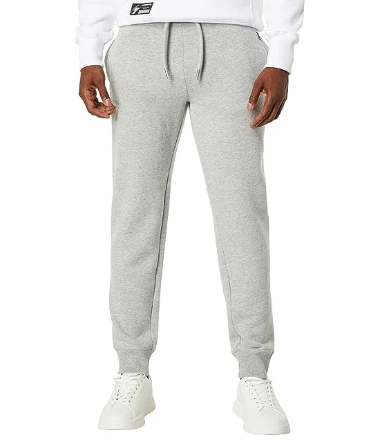 https://images.styletyx.com/images/vintage-logo-embroidered-joggers-superdry-13631129_1.webp