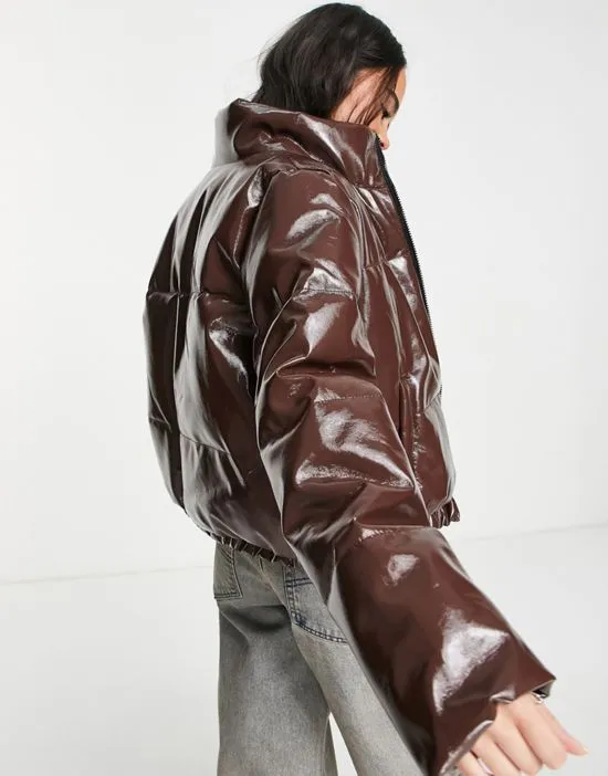 https://images.styletyx.com/images/vinyl-padded-jacket-in-brown-noisy-may-2941243_4.webp
