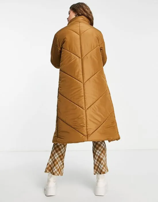 https://images.styletyx.com/images/violet-romance-longline-puffer-coat-with-funnel-neck-in-tan-violet-romance-1955894_2.webp