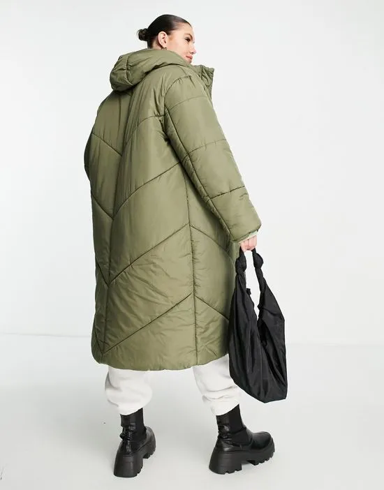 https://images.styletyx.com/images/violet-romance-plus-longline-puffer-coat-in-olive-violet-romance-curve-1954939_3.webp