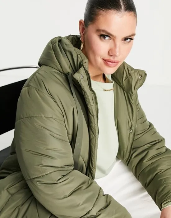 https://images.styletyx.com/images/violet-romance-plus-longline-puffer-coat-in-olive-violet-romance-curve-1954939_4.webp