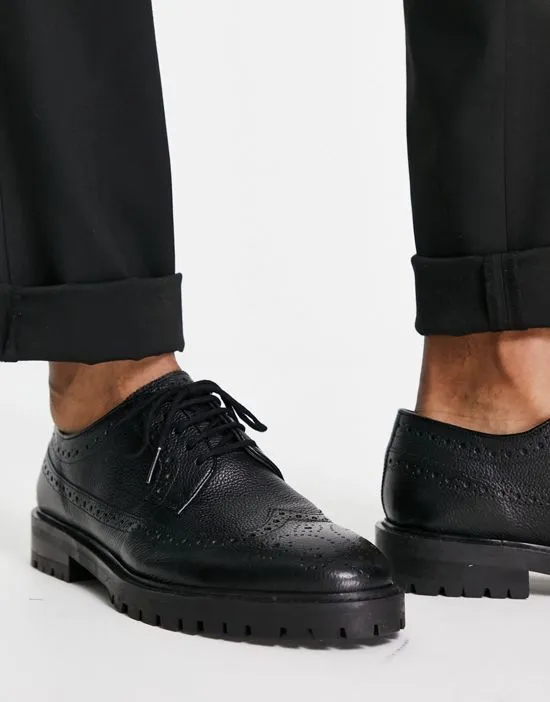 https://images.styletyx.com/images/walk-london-james-chunky-brogues-in-black-leather-walk-london-13663401_2.webp