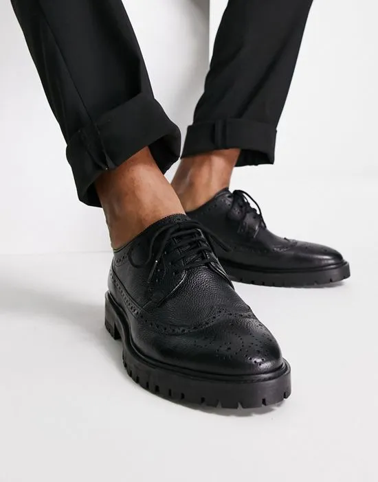 https://images.styletyx.com/images/walk-london-james-chunky-brogues-in-black-leather-walk-london-13663401_3.webp