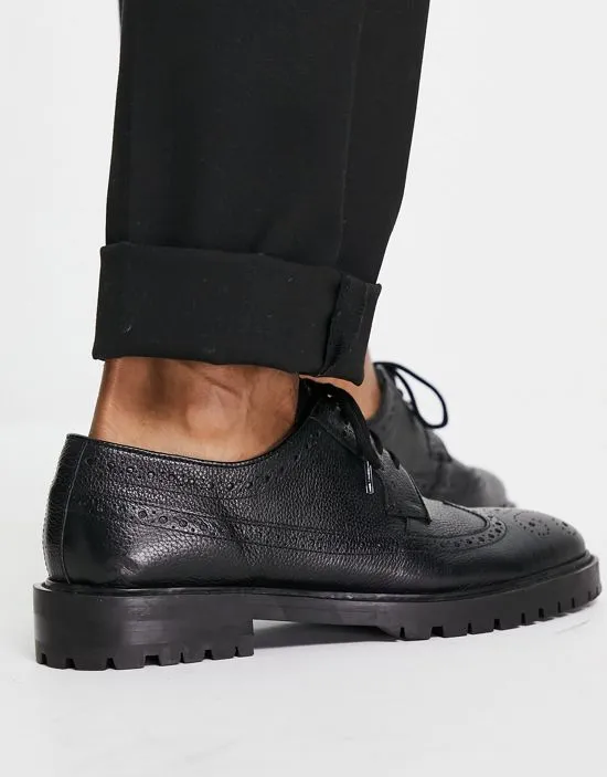 https://images.styletyx.com/images/walk-london-james-chunky-brogues-in-black-leather-walk-london-13663401_4.webp