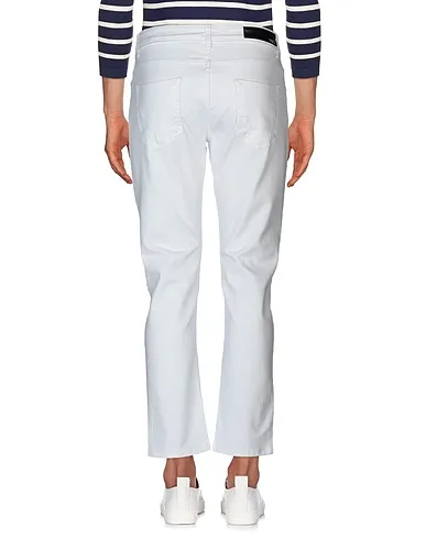 https://images.styletyx.com/images/white-denim-denim-pants-madd-13532803_3.webp