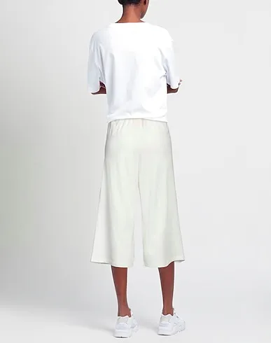 https://images.styletyx.com/images/white-jersey-casual-pants-empathie-1314569579_3.webp