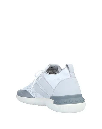 https://images.styletyx.com/images/white-knitted-sneakers-tod-s-no-code-1622964_3.webp