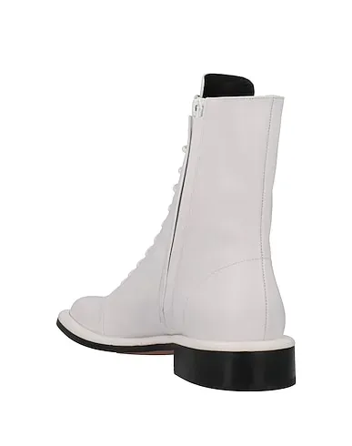 https://images.styletyx.com/images/white-leather-ankle-boot-proenza-schouler-3294360_3.webp