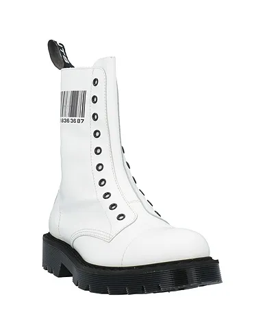 https://images.styletyx.com/images/white-leather-boots-vetements-12992940_2.webp