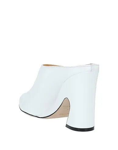 https://images.styletyx.com/images/white-leather-mules-and-clogs-giannico-634910_3.webp