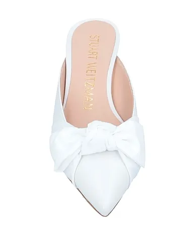 https://images.styletyx.com/images/white-leather-mules-and-clogs-stuart-weitzman-1467423_4.webp