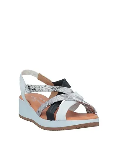 https://images.styletyx.com/images/white-leather-sandals-andrea-sabatini-13154812_2.webp