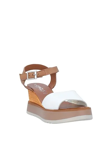 https://images.styletyx.com/images/white-leather-sandals-cinzia-soft-969214_2.webp