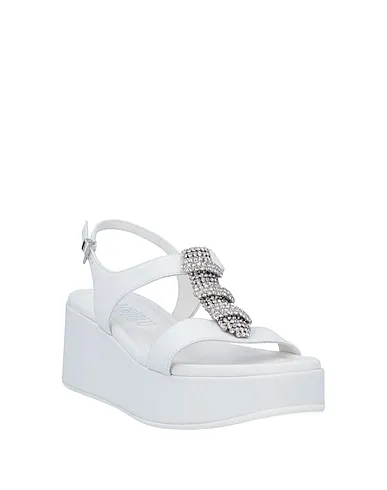 https://images.styletyx.com/images/white-leather-sandals-loriblu-2953720_2.webp