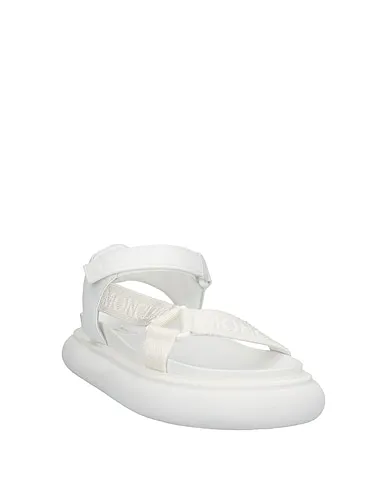 https://images.styletyx.com/images/white-leather-sandals-moncler-2866389_2.webp